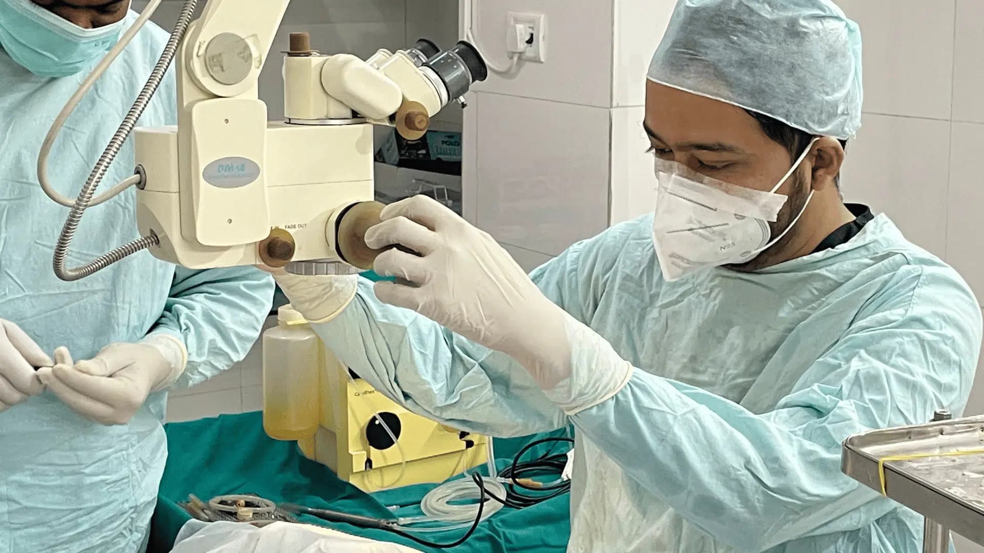 Dr. Mujahid Islam preparing ophthalmic surgical equipment at Eye First Superspeciality Eye Care