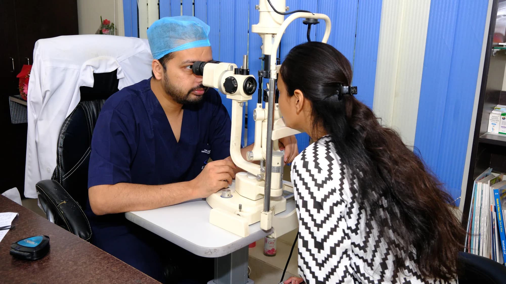 Dr. Mujahid Islam consulting a patient at Eye First Superspeciality Eye Care